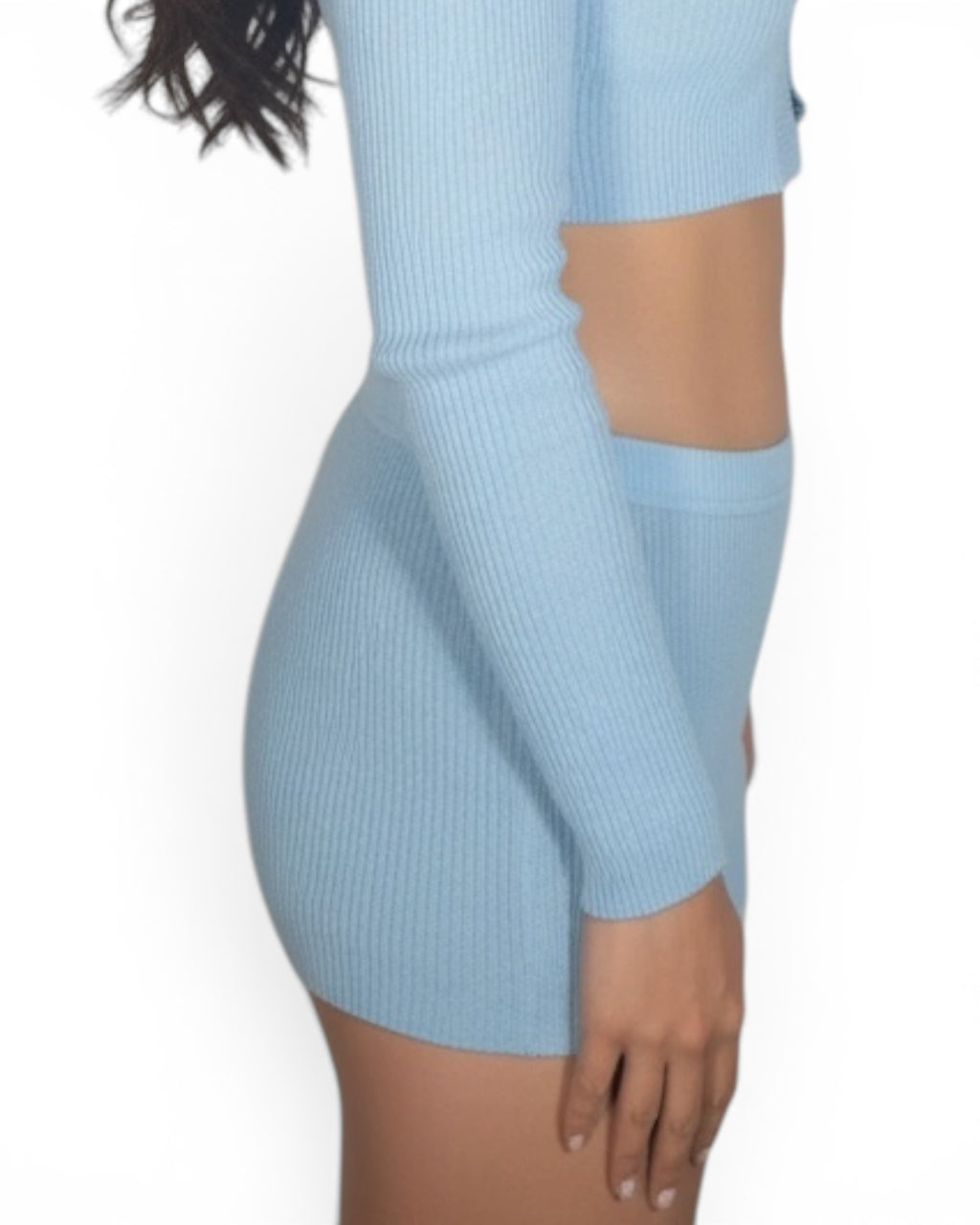 Light blue ribbed dress worn by a person on a white background