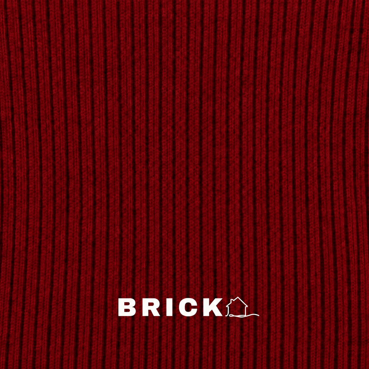 The Sculpt Tube Skirt rib knit swatch - brick red - designed and made by The Knit House LA