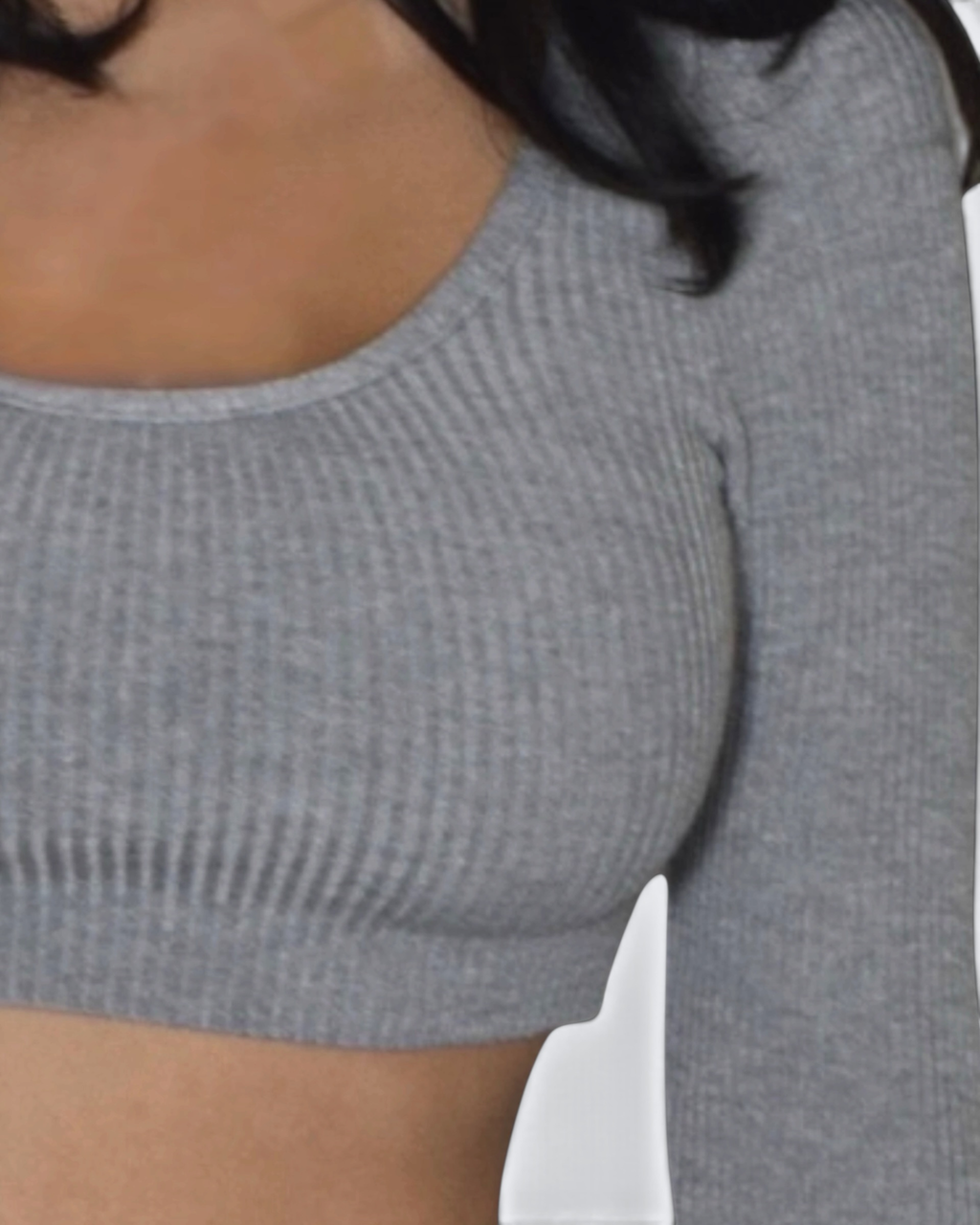 Gray ribbed scoop neck crop top worn by a person