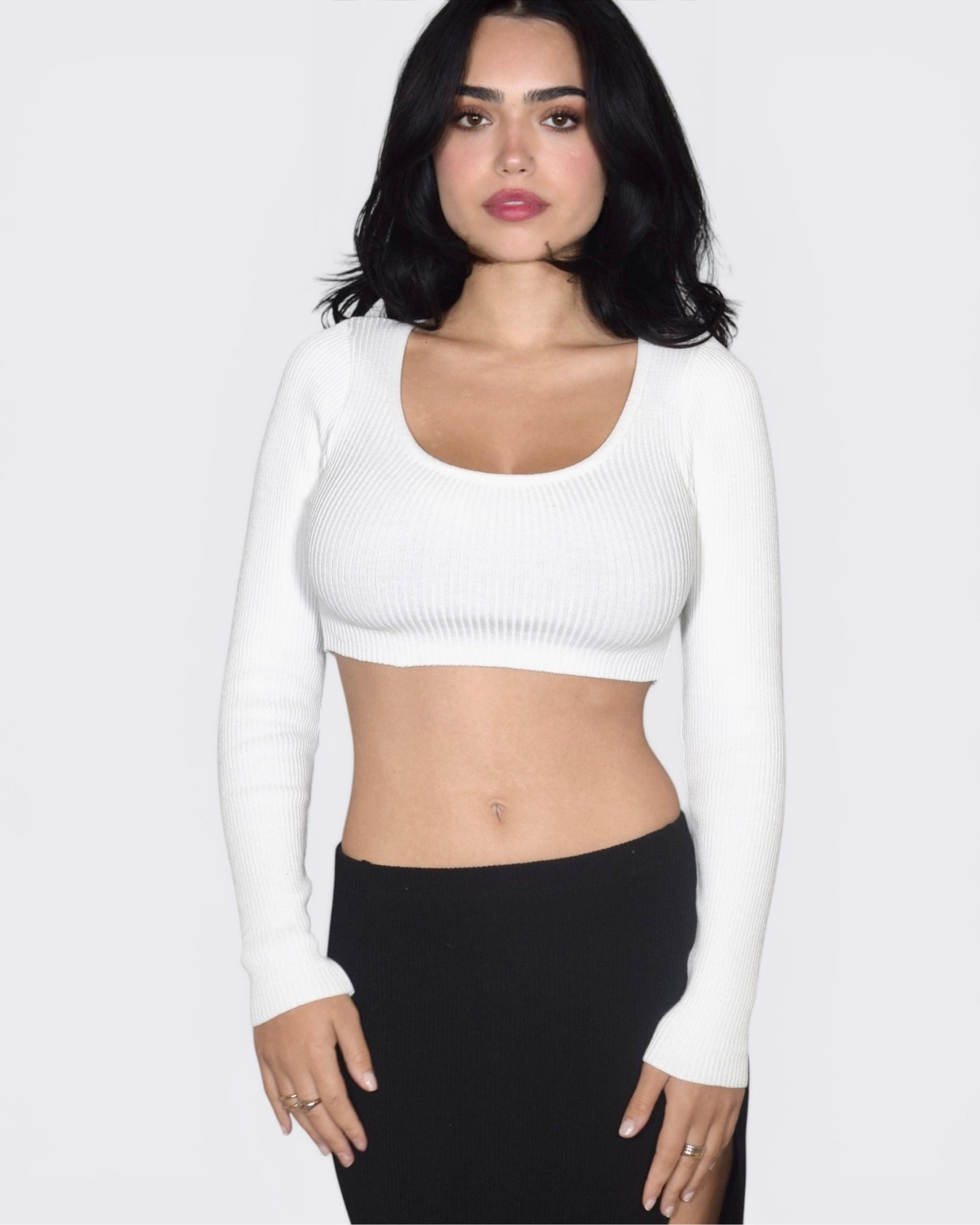 White Long sleeve crop scoop neck ribbed knit top with black skirt by The Knit House LA. 