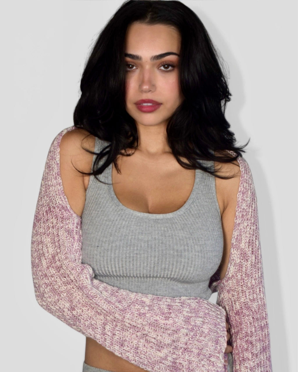Woman wearing grey scoop neck crop tank and pink shrug by The Knit House LA