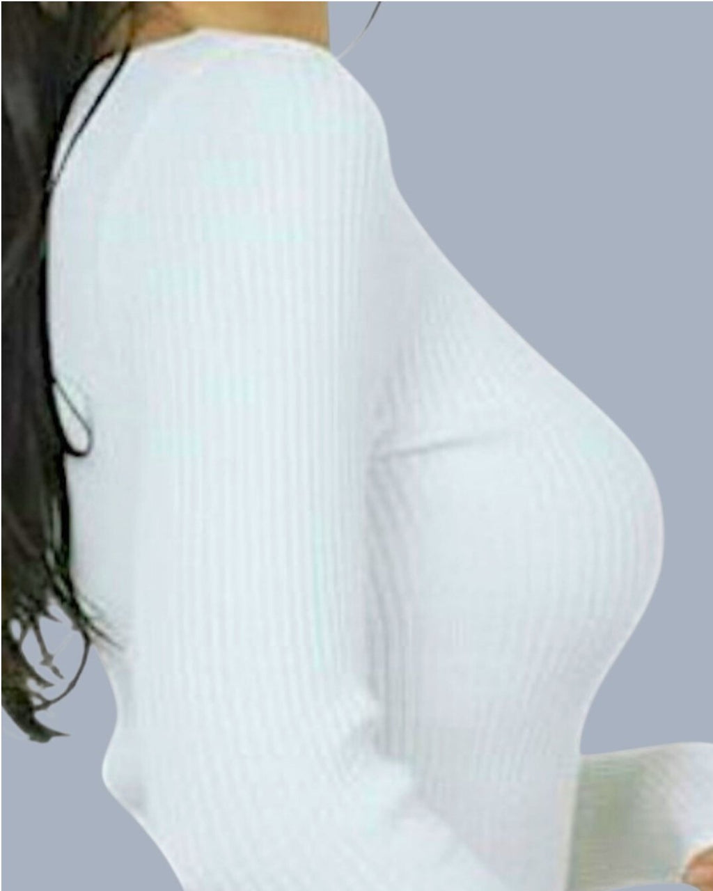 White ribbed scoop neck sweater worn by a person on a gray background