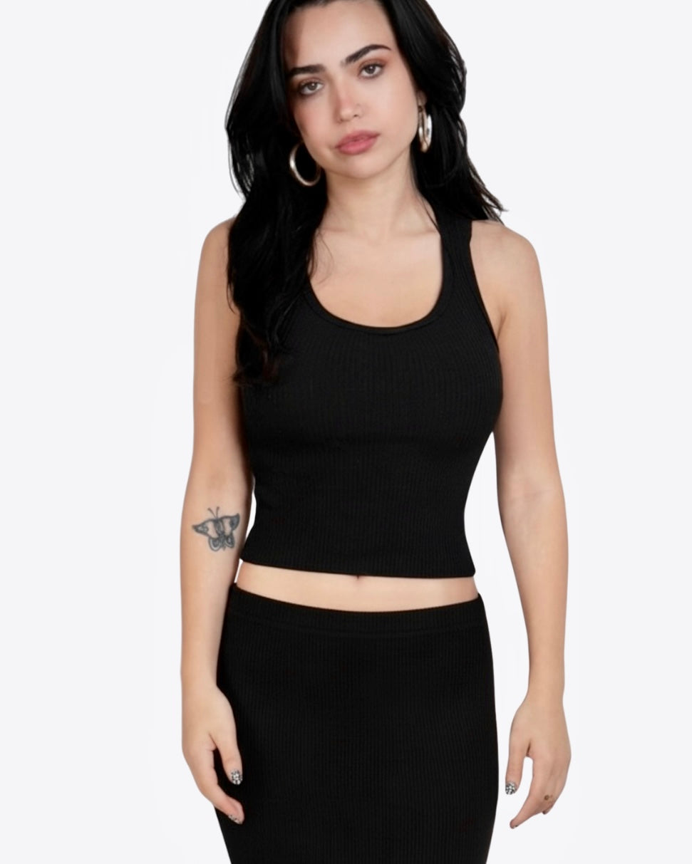 Woman wearing black rib knit scoop neck tank and skirt by The Knit House La