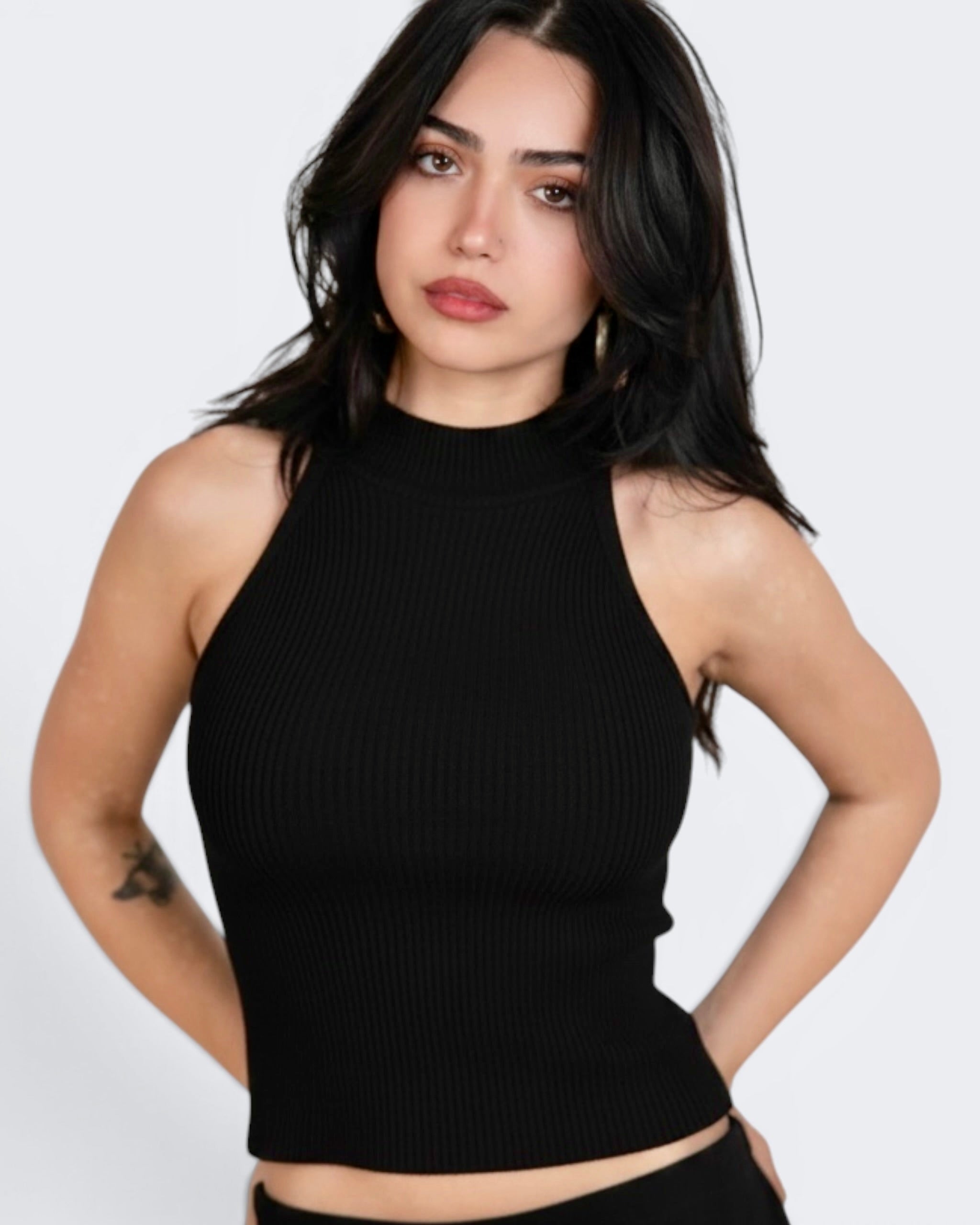 Black sleeveless mock-neck shell by The Knit House LA