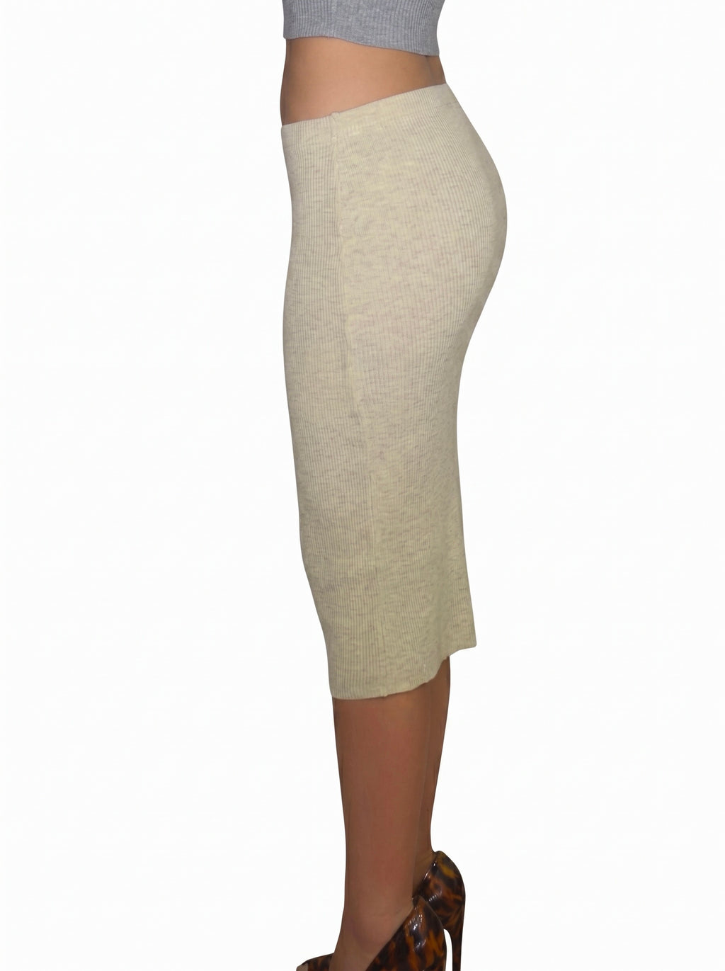 Side view of beige rib knit pencil skirt by TKHLA 
