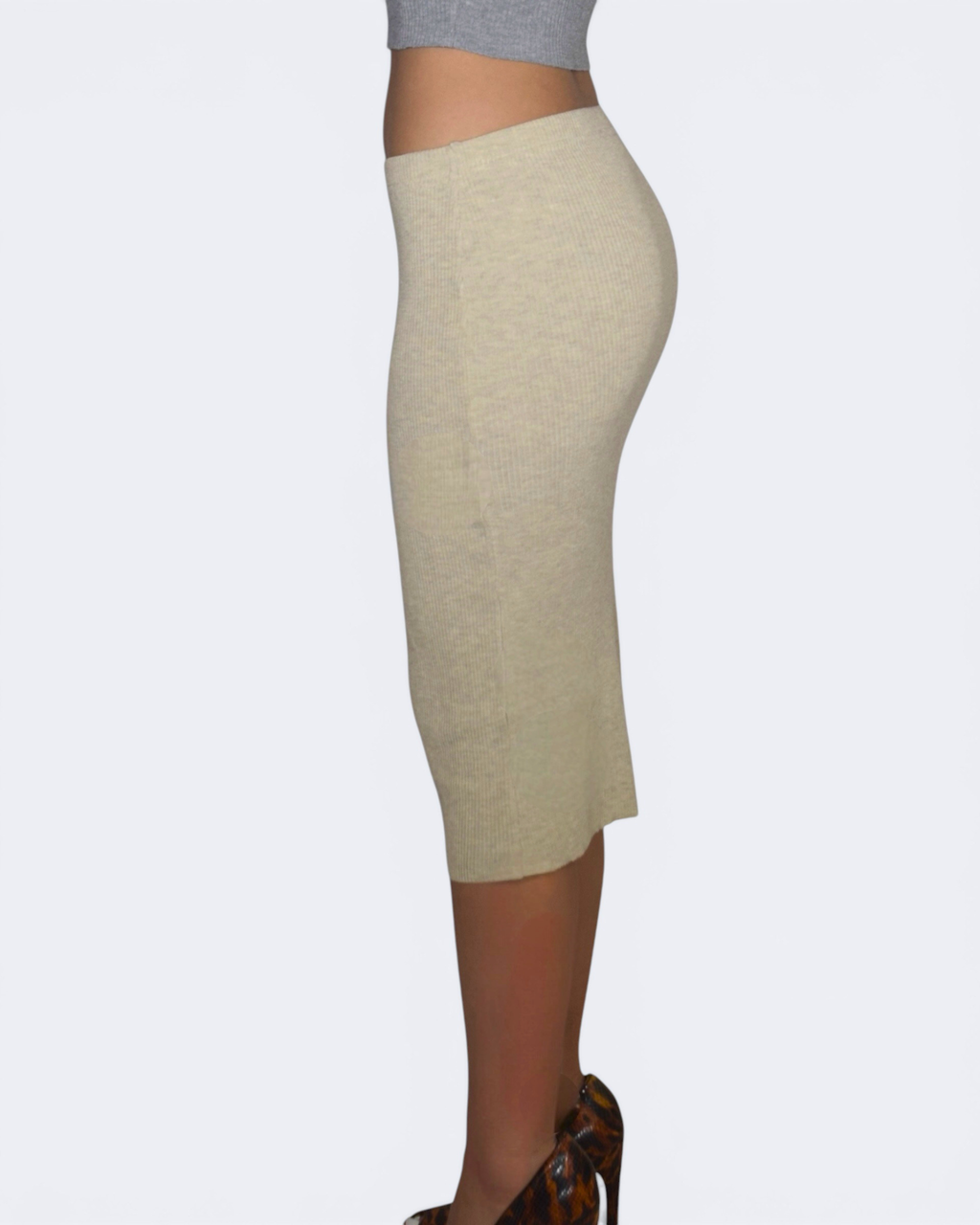 Drift Beige knee-length skirt worn by a person on a white background