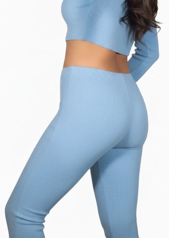 Light blue ribbed crop top and leggings set on a white background