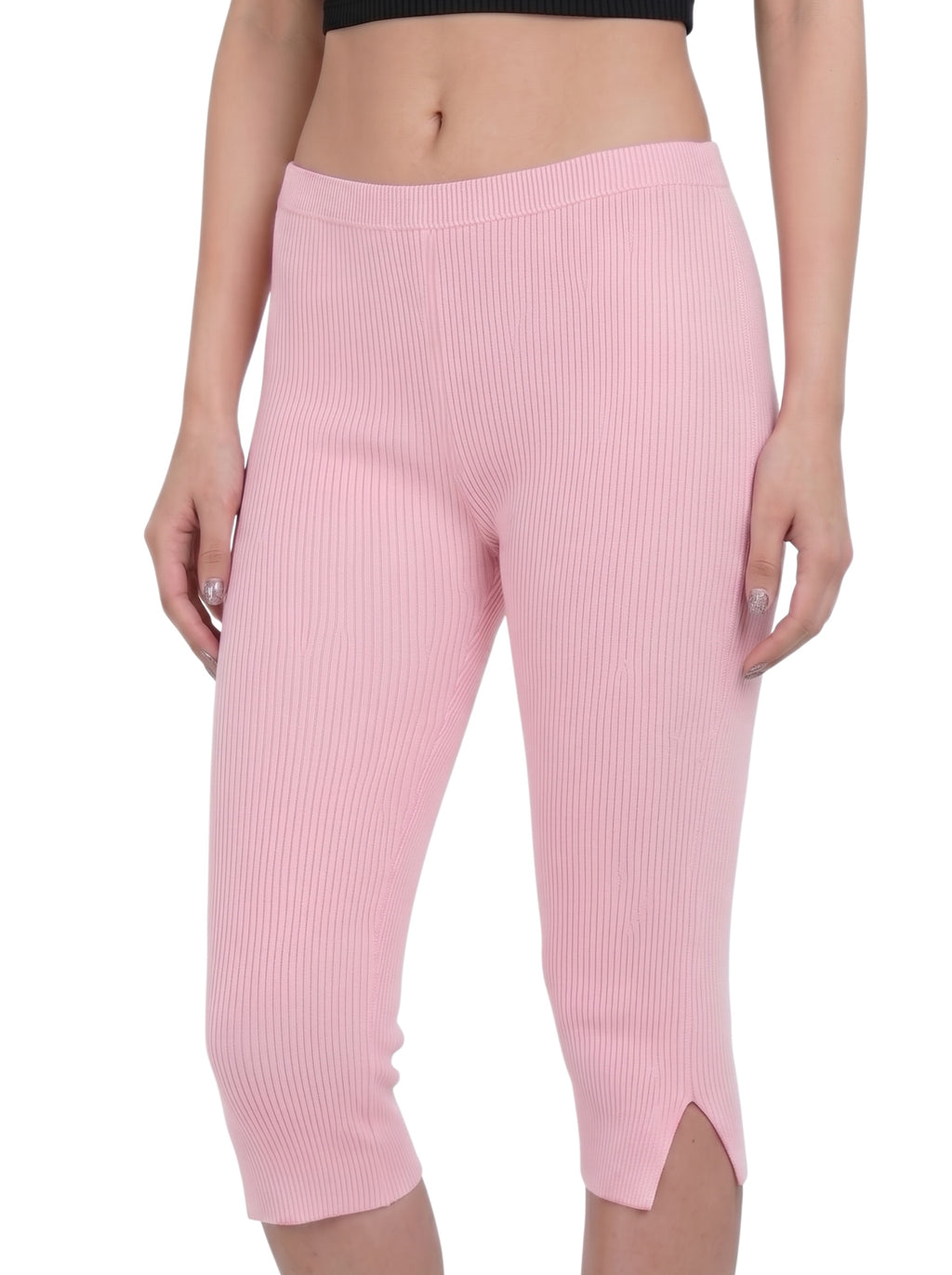 Person wearing pink rib knit Capri pants with side slit by TKHLA