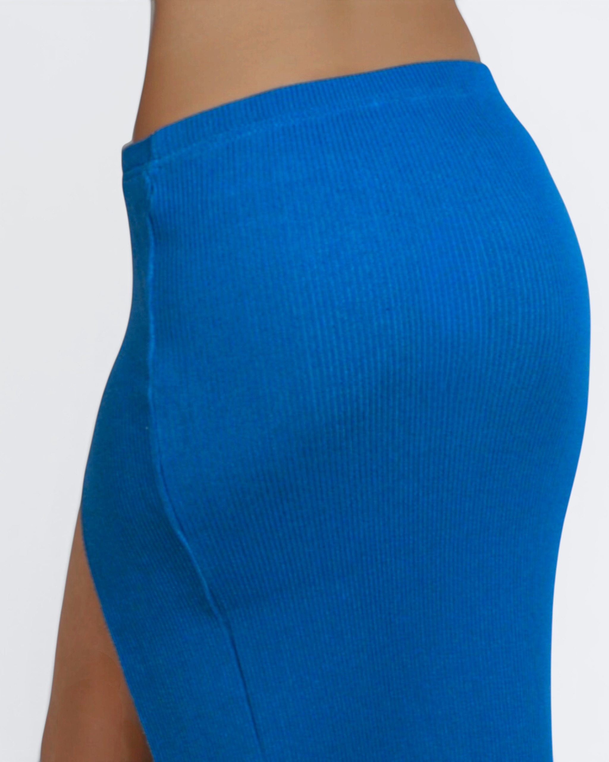 Back view of cobalt skirt with slit