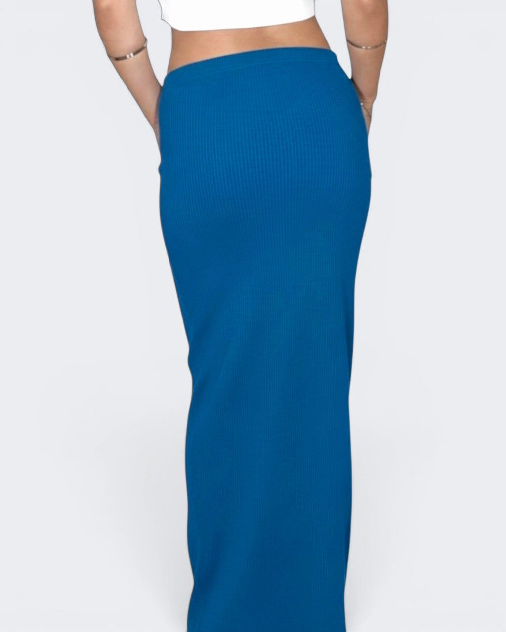 Woman wearing blue long straight skirt by The Knit House LA