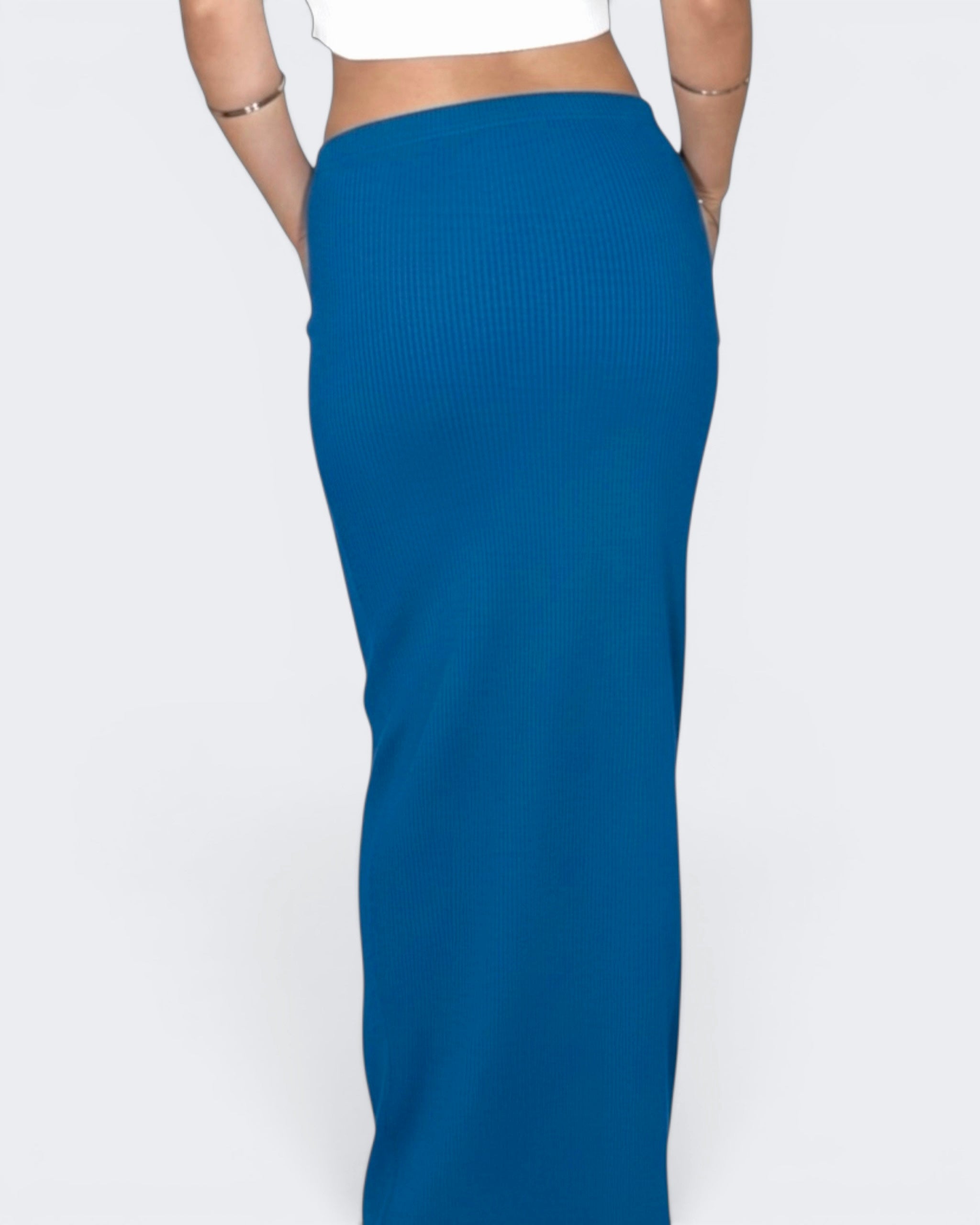 Woman wearing blue long straight skirt by The Knit House LA