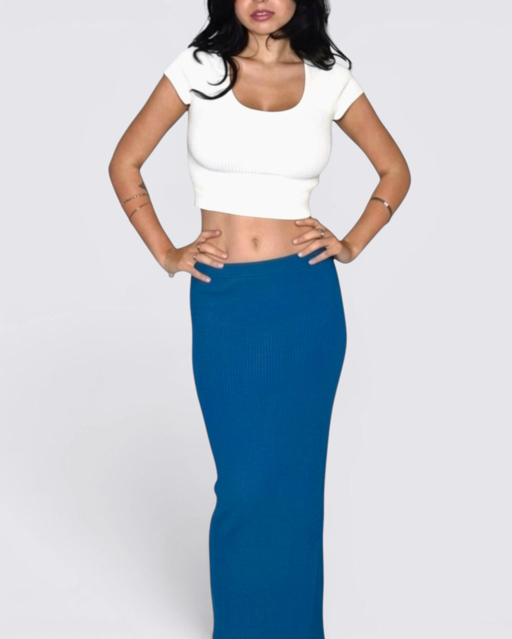 Woman wearing cobalt blue long pencil skirt by The Knit House LA