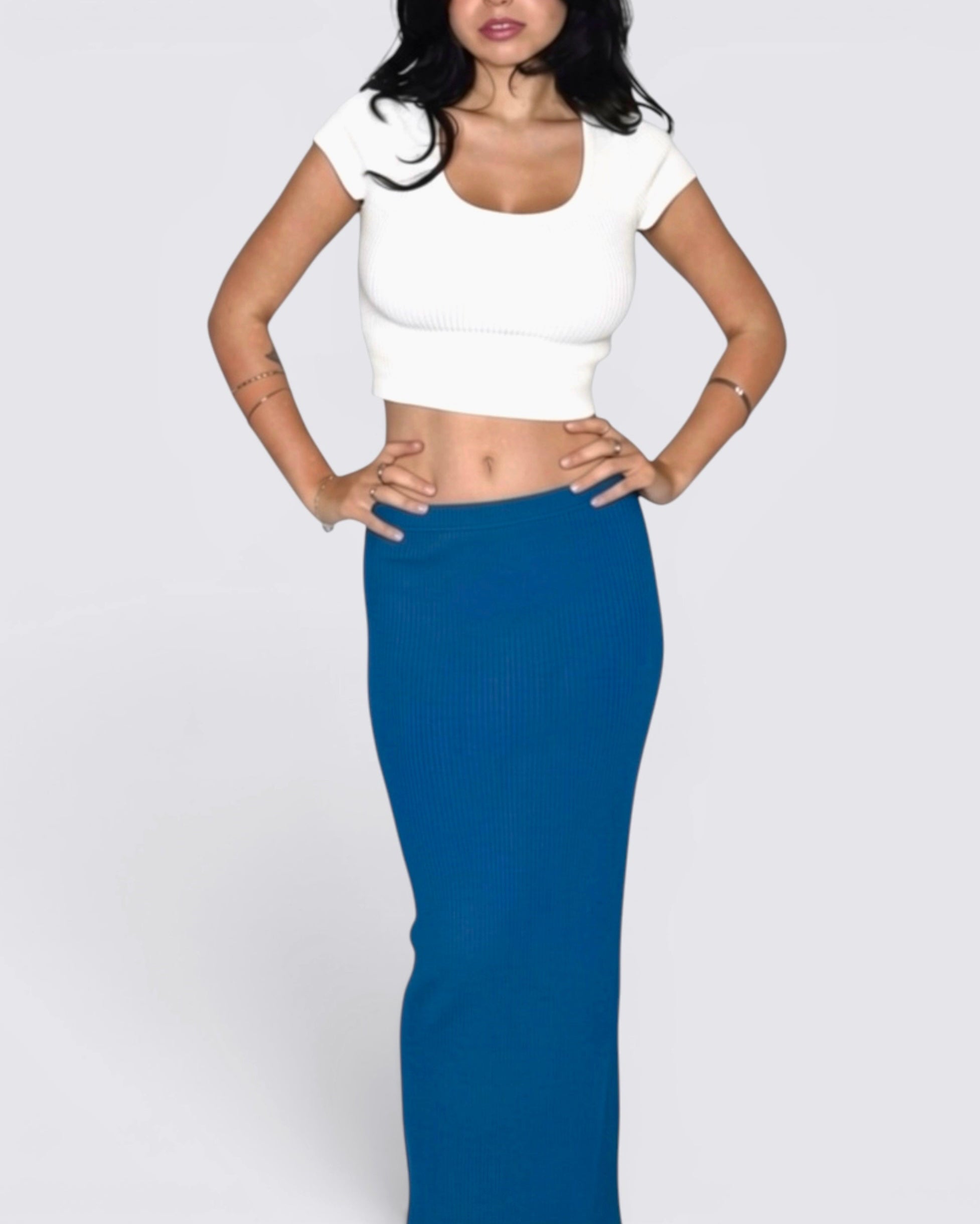 Woman wearing cobalt blue long pencil skirt by The Knit House LA