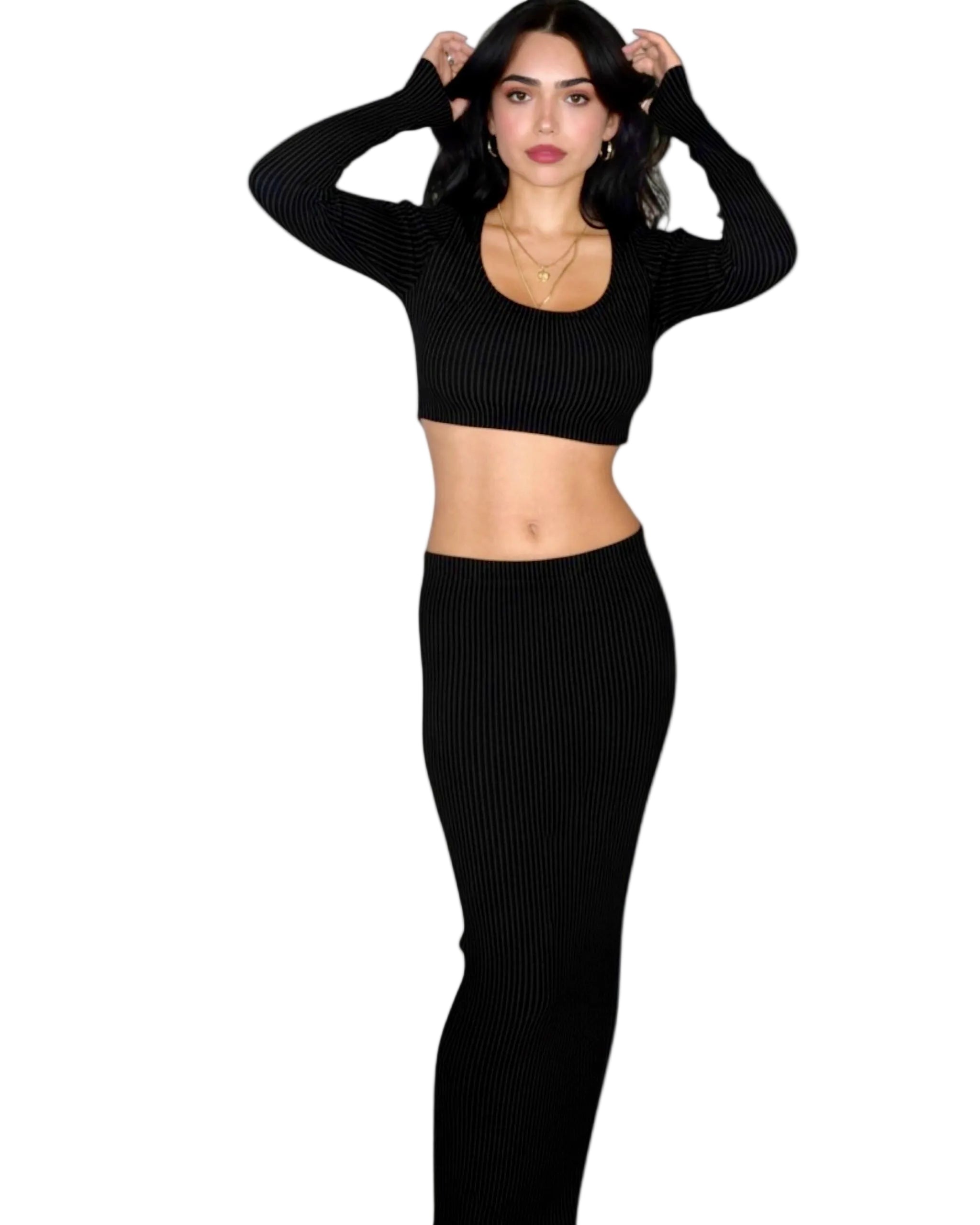 Woman wearing black rib knit crop long sleeve scoop neck top and long straight skirt by TKHLA