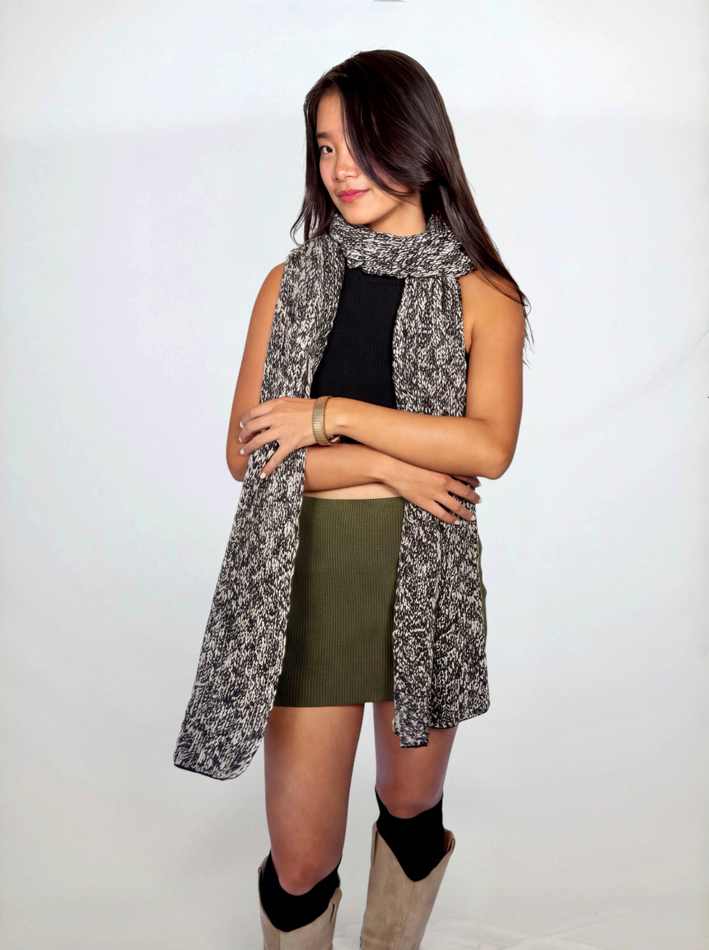 Sculpt Mini in Combat — front view, layered with marled scarf, styled with Form Crop Shell in Ink.