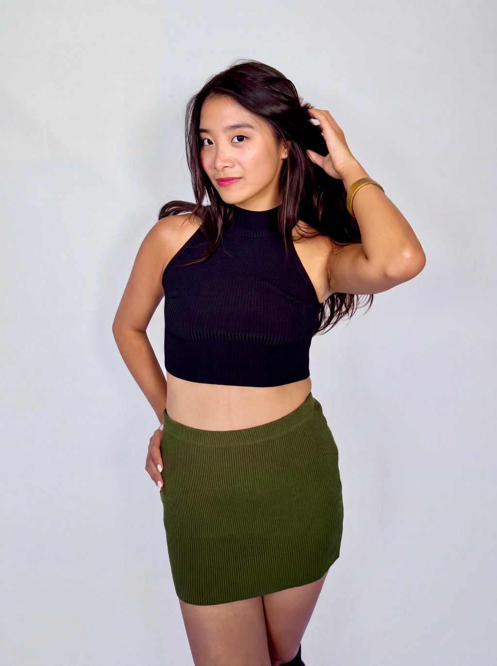 Sculpt Mini in Combat — front view, styled with Form Crop Shell in Ink.