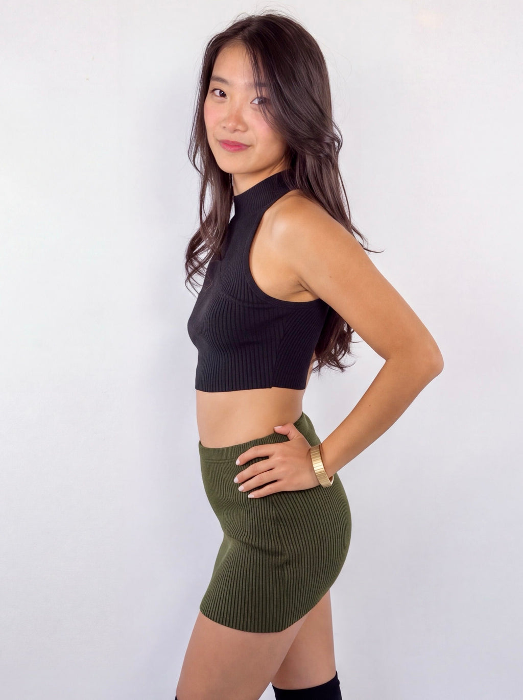 Sculpt Mini in Combat — side view, styled with Form Crop Shell in Ink.
