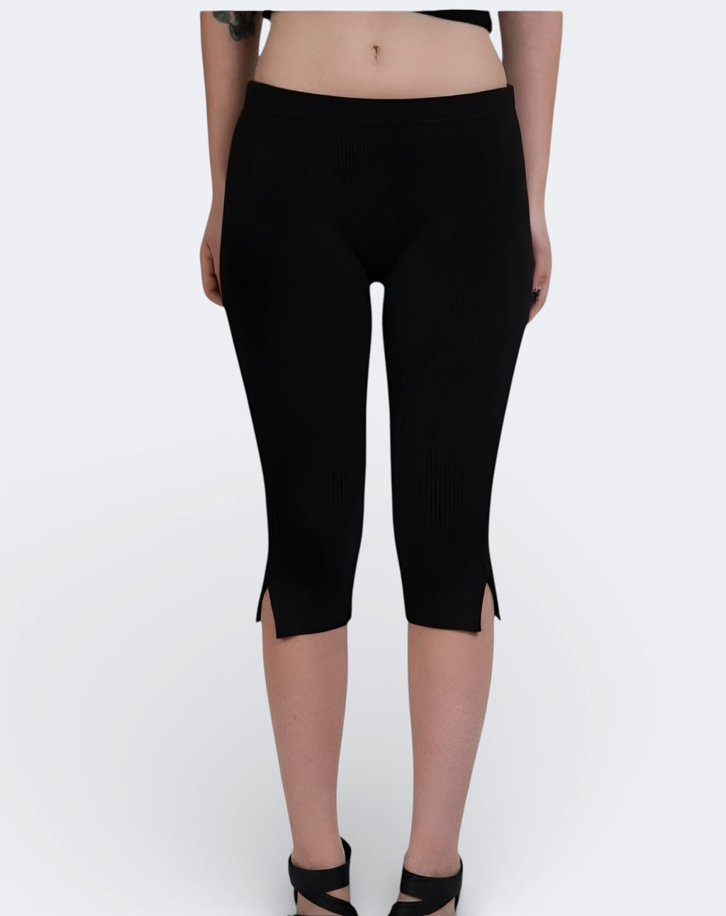 front view of fitted rib knit capri with side slit detail in Ink Black by The Knit House LA.