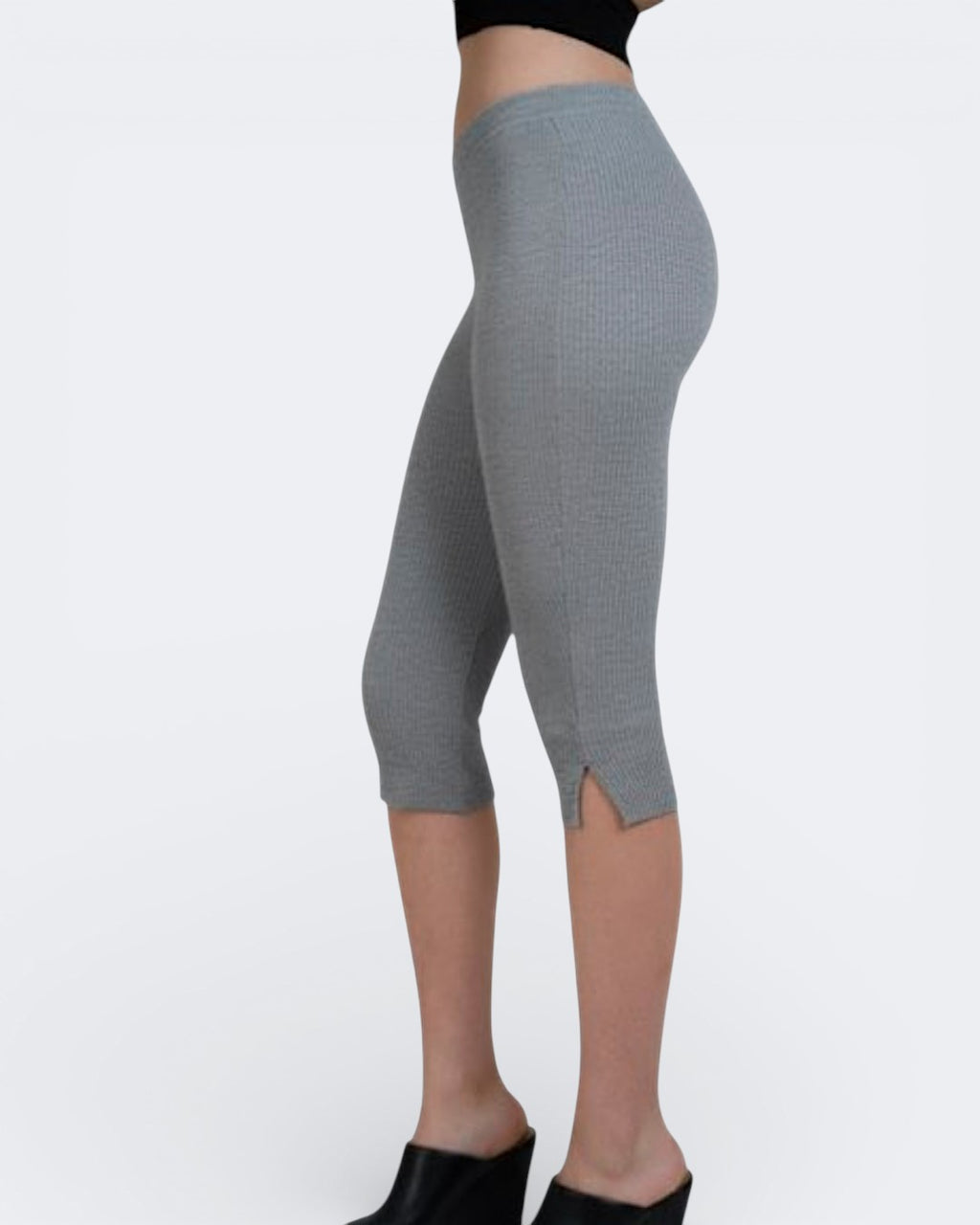 Side view of fitted rib knit Capri pants with side slit in Mist grey by The Knit House LA.