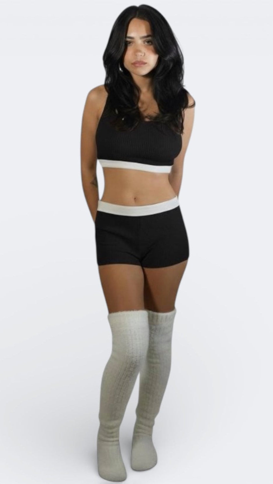 woman wearing fitted rib knit crop tank with scoop neckline and matching boy short in Ink black by The Knit House LA.