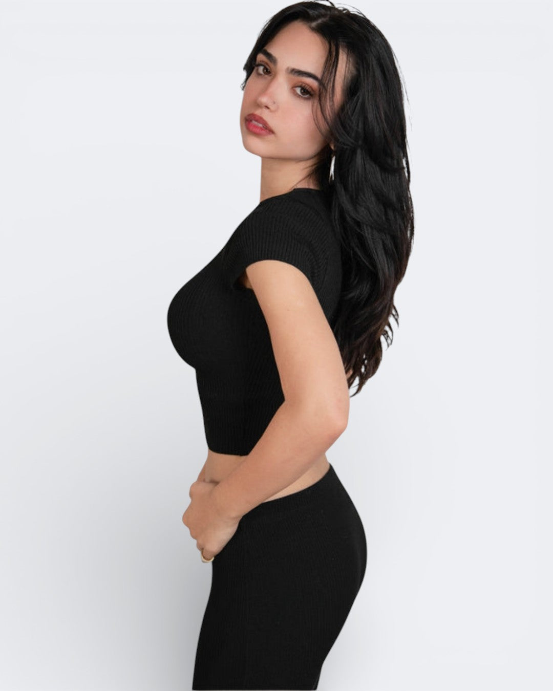 Side view of knitted rib knit crop top with short sleeve and scoop neckline in Ink black by The Knit House LA