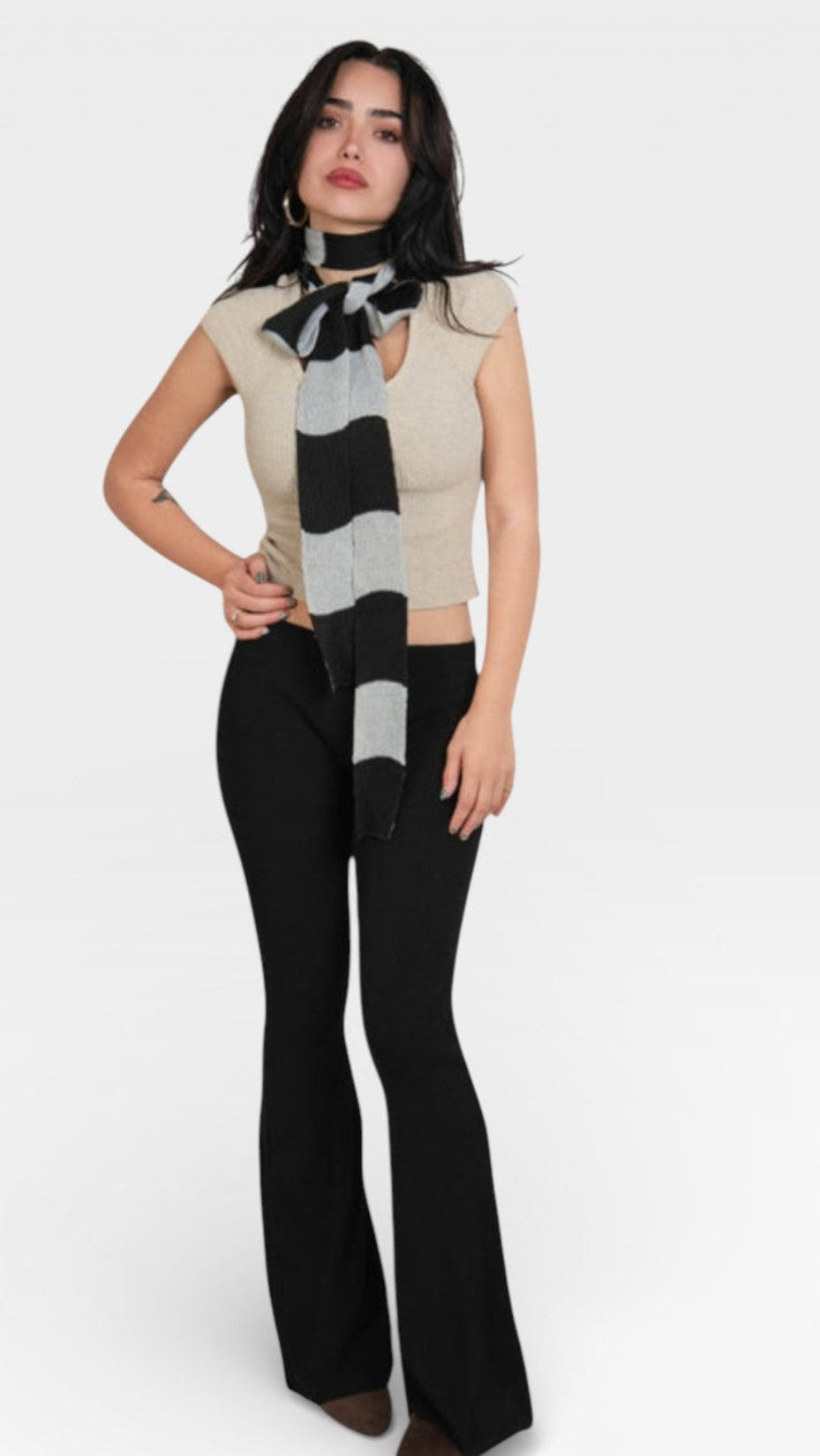 Woman wearing a Fitted rib knit short sleeve top with scoop neckline in Drift beige by - The Knit House LA