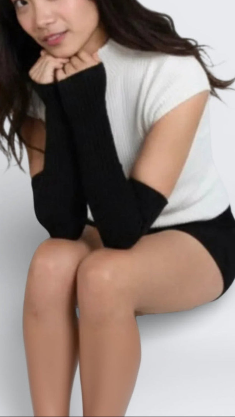 Woman wearing rib knit armwarmers in Ink black by The Knit House LA.