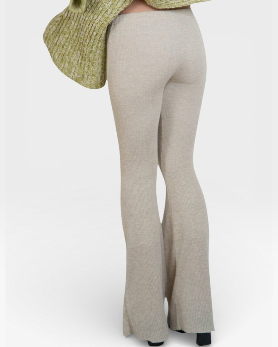 Back view of fitted rib knit flared leg pant in Drift beige by The Knit House LA.