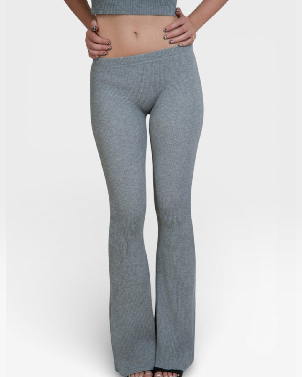 Close up of fitted rib knit flared leg pant and crop top in Mist grey by The Knit House LA.