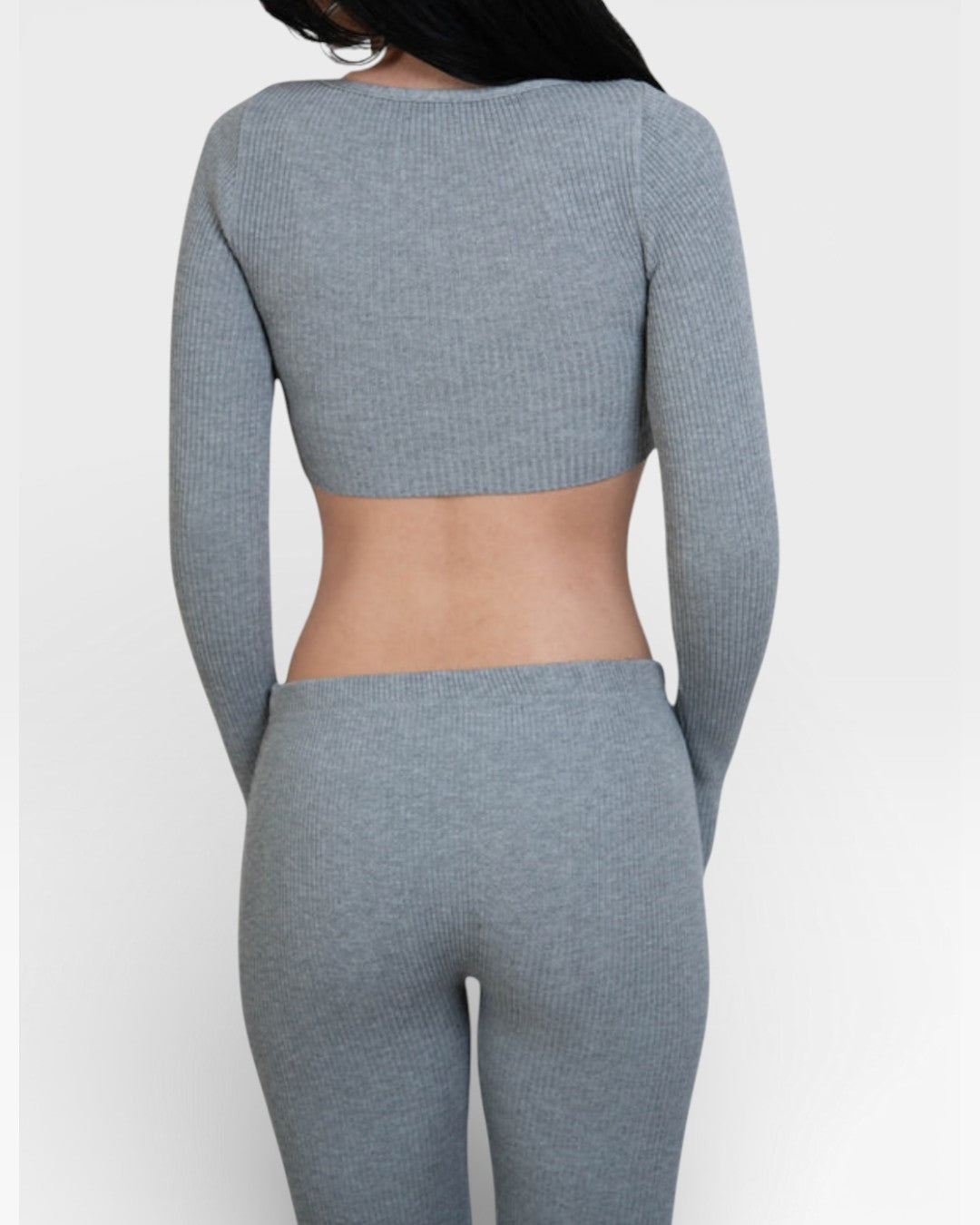Back view of fitted rib knit flared leg pant and crop top in Mist grey by The Knit House LA.