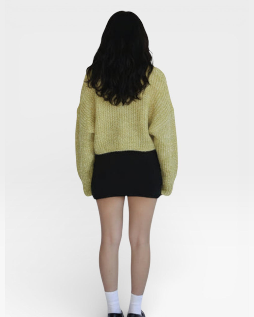 Back view of rib knit mini skirt and top in Ink black and green shrug by The Knit House LA.