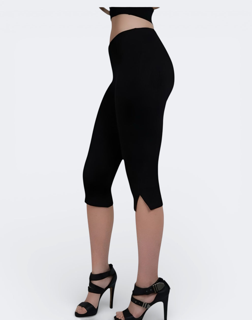 side view of fitted rib knit capri with side slit detail in Ink Black by The Knit House LA.