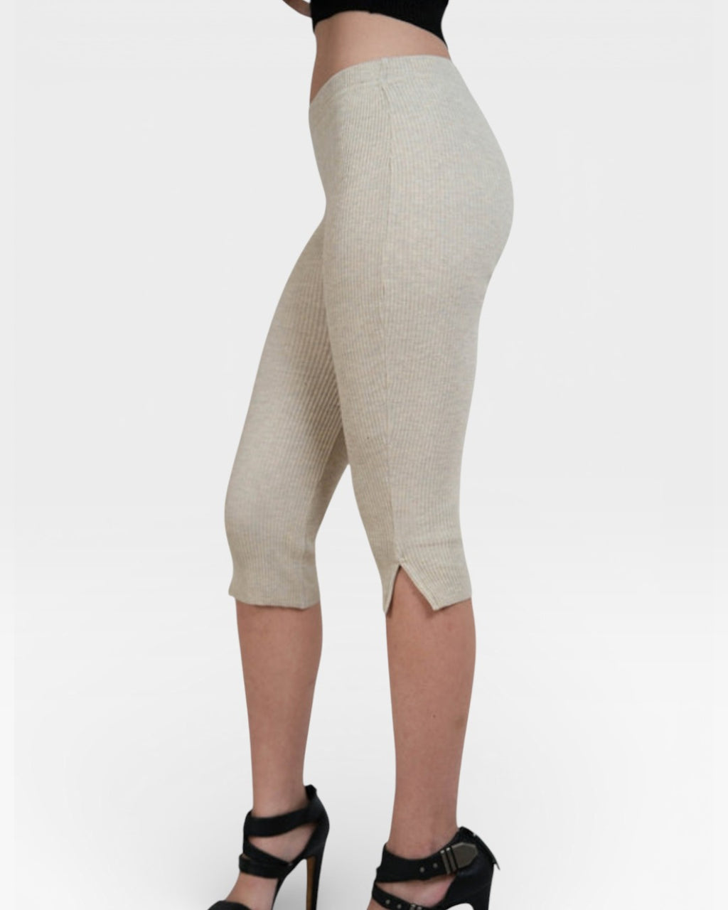 Side view of fitted rib knit capri pant with side slit in Drift beige by The Knit House LA.