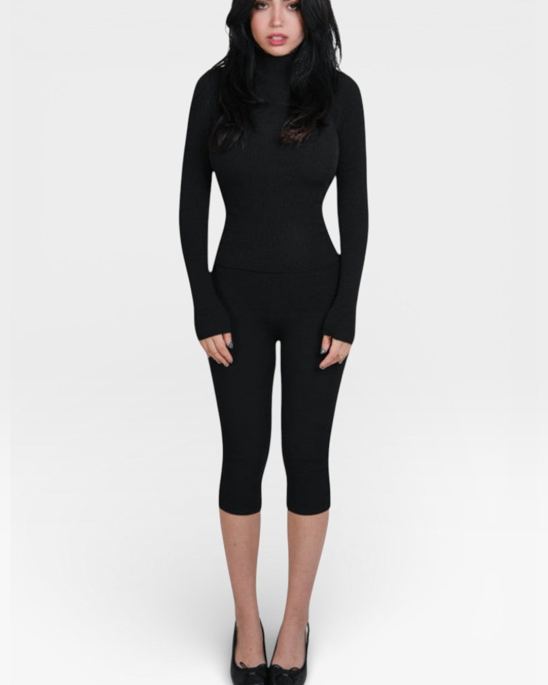 woman wearing fitted rib knit capri with matching turtleneck top in Ink black by The Knit House LA.