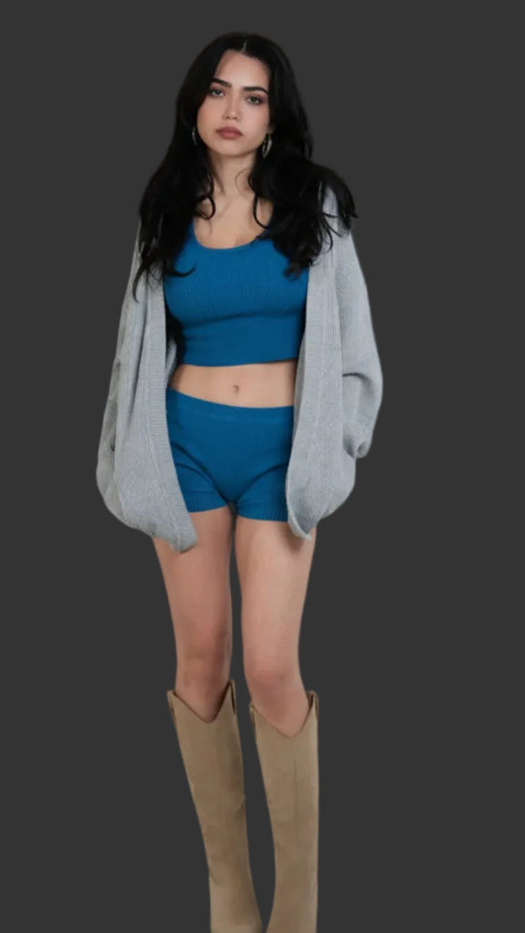 woman wearing rib knit relaxed oversized cardigan in Mist grey by The Knit House LA.