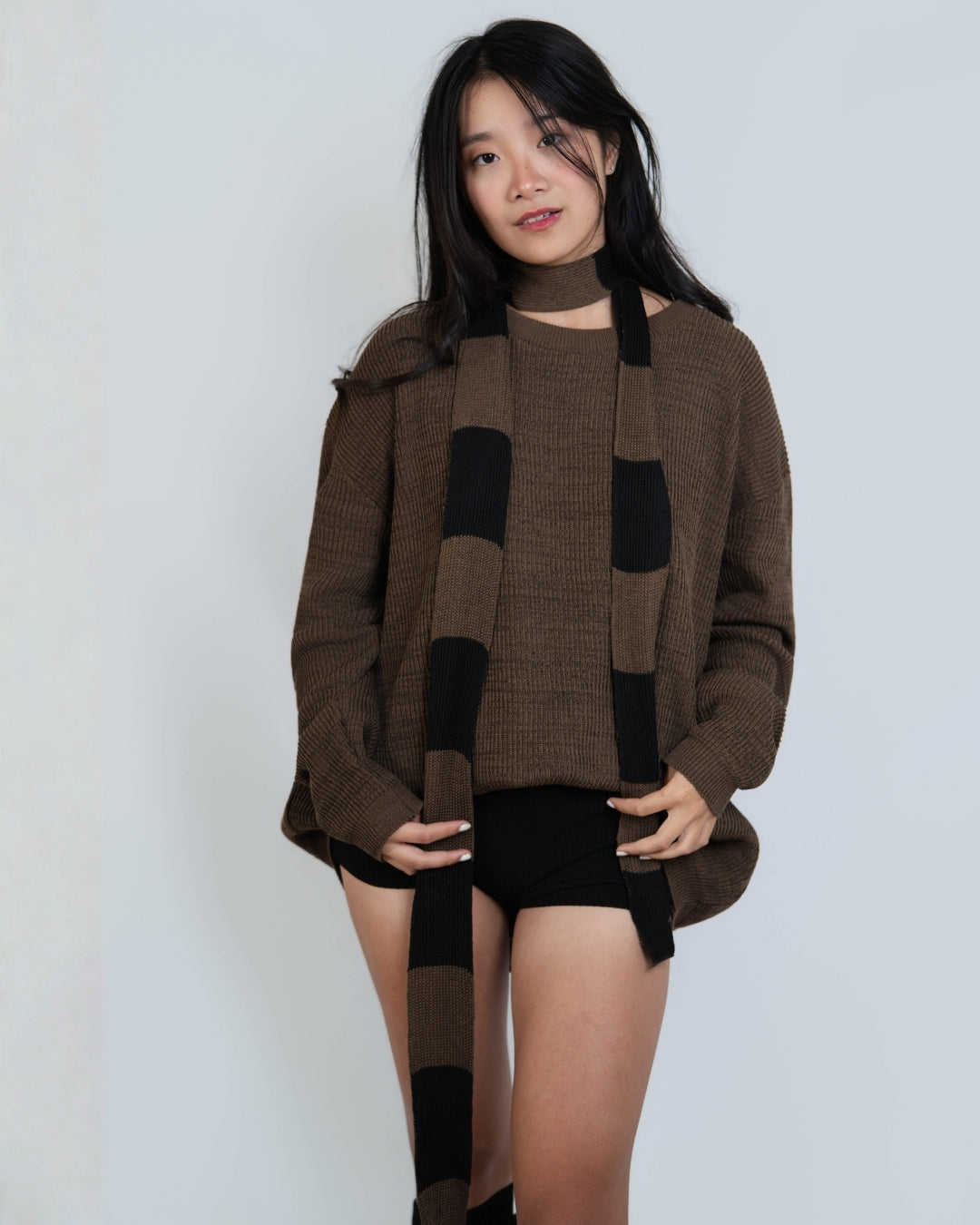 woman wearing rib knit long sleeve oversized crew neck sweater in Bark brown by The Knit House LA.