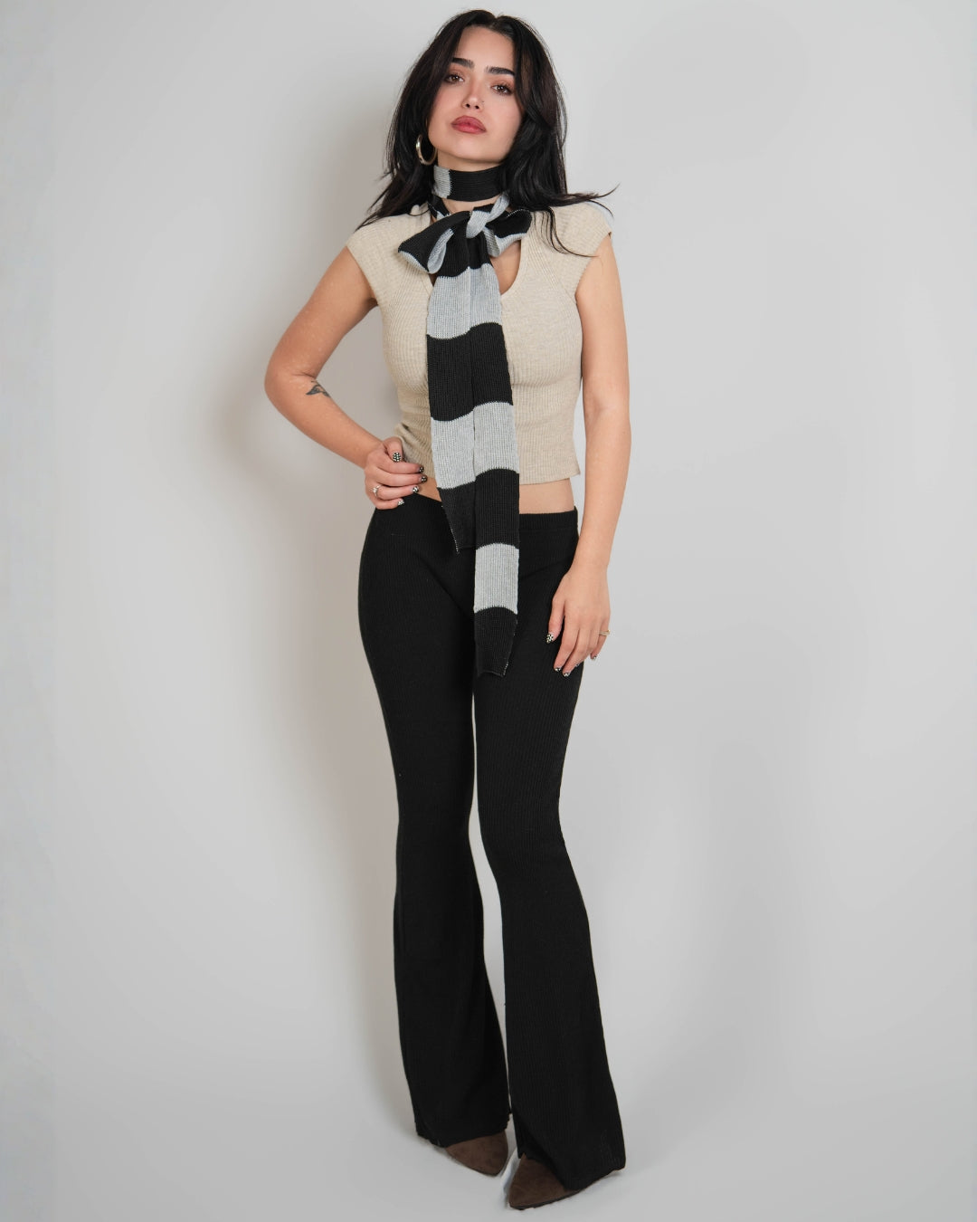 woman wearing extra long skinny stripe knit scarf in Slate grey and Coal black by The Knit House LA