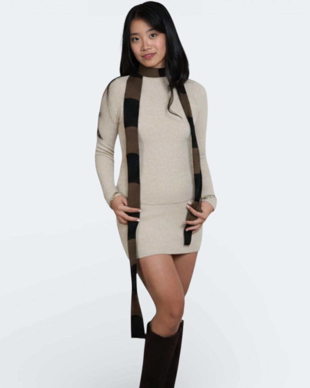 Woman wearing extra long skinny knit scarf in Bark brown and Coal black by The Knit House LA.